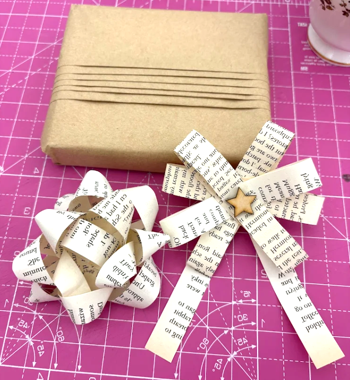 Gift bows and wrap made from book paper at a craft wrkshop